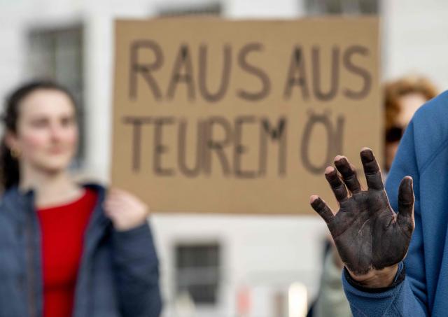 Fridays for Future activists protest outside the Federal Chancellery in Vienna on March 10, 2026, calling for a climate-friendly June budget without oil and gas subsidies. As crude oil prices rise, the impact goes far beyond Austria’s petrol stations, since the long-term costs of fossil-fuel investments are far higher due to global-warming impacts. (Photo by Joe Klamar / AFP)