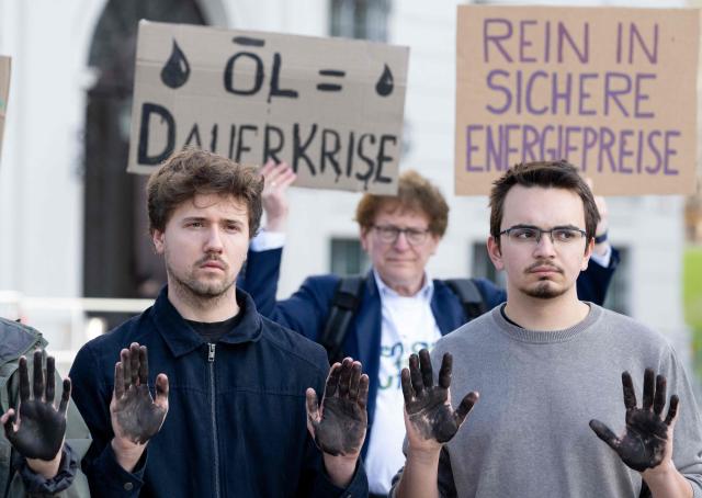 Fridays for Future activists protest outside the Federal Chancellery in Vienna on March 10, 2026, calling for a climate-friendly June budget without oil and gas subsidies. As crude oil prices rise, the impact goes far beyond Austria’s petrol stations, since the long-term costs of fossil-fuel investments are far higher due to global-warming impacts. (Photo by Joe Klamar / AFP)