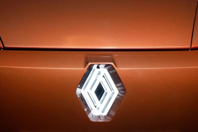 This photograph shows a Renault logo on a vehicle diplayed during a press preview at the Renault's technocentre in Guyancourt, near Paris on March 10, 2026. (Photo by Kenzo TRIBOUILLARD / AFP)