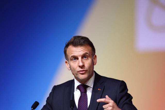 French President Emmanuel Macron addresses the Nuclear Energy Summit at the Seine Musicale venue in Boulogne-Billancourt, outside Paris, on March 10, 2026. (Photo by Abdul Saboor / POOL / AFP)