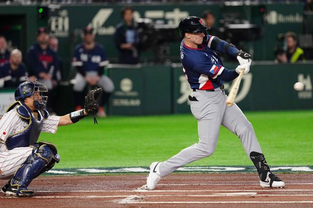 Czech Republic's Marek Chlup hits a singles during the World Baseball Classic (WBC) Pool C game between Japan and Czech Republic at the Tokyo Dome in Tokyo on March 10, 2026. (Photo by Yuichi YAMAZAKI / AFP)