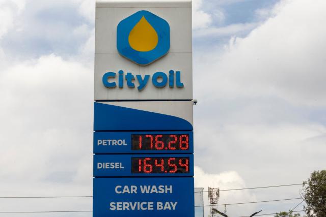 A sign outside a fuel station shows the petrol and diesel prices in Nairobi on March 10, 2026. (Photo by SIMON MAINA / AFP)
