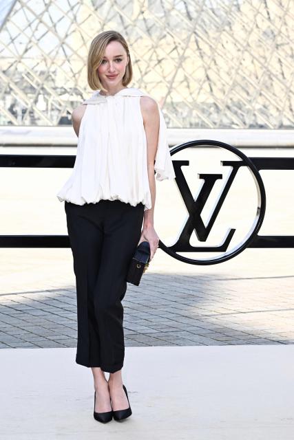 British actress Phoebe Dynevor poses during a photocall prior to attend the Louis Vuitton Women's Ready to Wear Fall/Winter 2026-2027 collection fashion show as part of the Paris Women Fashion Week, in Paris, on March 10, 2026. (Photo by JULIEN DE ROSA / AFP)
