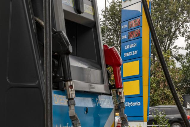 A sign outside a fuel station shows the petrol and diesel prices in Nairobi on March 10, 2026. (Photo by SIMON MAINA / AFP)