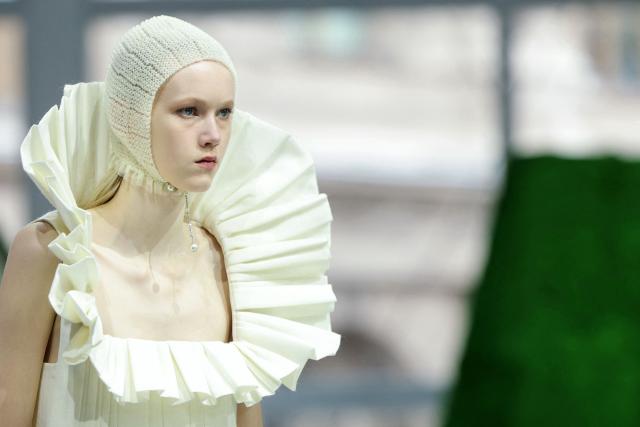 A model presents a creation for Louis Vuitton for the Women's Ready to Wear Fall/Winter 2026-2027 collection fashion show as part of the Paris Women Fashion Week, in Paris, on March 10, 2026. (Photo by Thomas SAMSON / AFP)