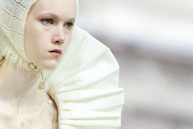 A model presents a creation for Louis Vuitton for the Women's Ready to Wear Fall/Winter 2026-2027 collection fashion show as part of the Paris Women Fashion Week, in Paris, on March 10, 2026. (Photo by Thomas SAMSON / AFP)