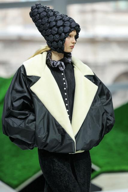 A model presents a creation for Louis Vuitton for the Women's Ready to Wear Fall/Winter 2026-2027 collection fashion show as part of the Paris Women Fashion Week, in Paris, on March 10, 2026. (Photo by Thomas SAMSON / AFP)