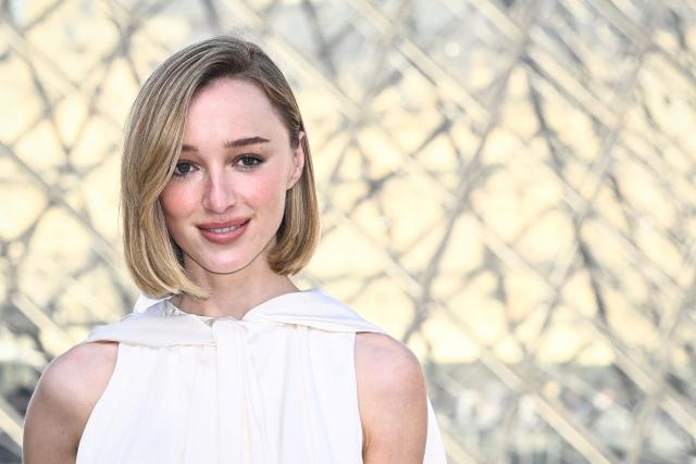 British actress Phoebe Dynevor poses during a photocall prior to attend the Louis Vuitton Women's Ready to Wear Fall/Winter 2026-2027 collection fashion show as part of the Paris Women Fashion Week, in Paris, on March 10, 2026. (Photo by JULIEN DE ROSA / AFP)