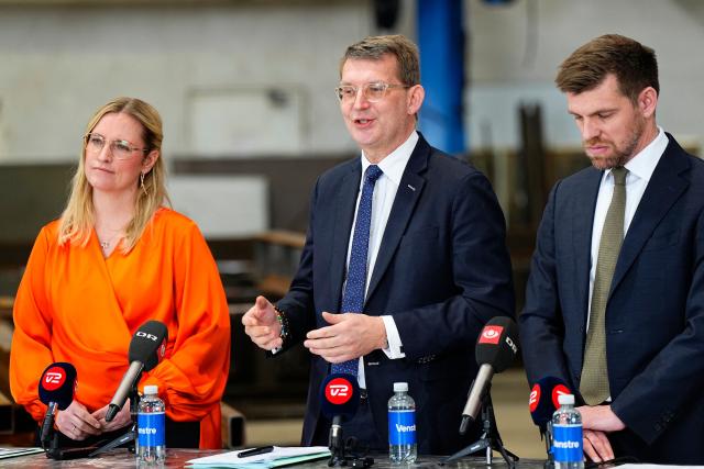 Denmark's defence minister, Venstre's party chairman and candidate for the prime minister position, Troels Lund Poulsen (C), Deputy chairman and Minister of Economic Affairs, Stephanie Lose, and Minister for Cities and Rural Districts, Morten Dahlin, present the business proposal 'Yes to good ideas' during a press conference in Herlev, Denmark on March 10, 2026, as the Danish parliamentary election will be held on March 24, 2026. (Photo by Sebastian Elias Uth / Ritzau Scanpix / AFP) / Denmark OUT