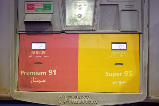 A fuel pump displays the price per liter for different gasoline grades at a gas station in Kuwait City on March 10, 2026. The Iran war sent oil prices soaring on March 9, after Tehran marked the appointment of its new supreme leader with a new barrage of missiles targeting Israel and the Gulf energy industry. (Photo by YASSER AL-ZAYYAT / AFP) / Attention editors: AFP covers the war in the Middle East through its extensive regional network, including bureaus in Tehran, Jerusalem, and several neighboring countries. Since the start of the conflict, journalists have been working under increasingly restrictive conditions. Authorities in several countries have limited reporters' movements, photo and live video coverage from sensitive locations. Some governments and armed groups have banned images of missile or drone strikes and other security-related sites. / 