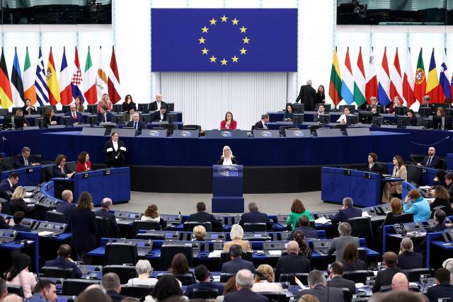 Irish activist Jackie Fox (C) addresses members of the European Parliament as part of International Women's Day during a plenary session on March 10, 2026, in Strasbourg, eastern France. (Photo by FREDERICK FLORIN / AFP)
