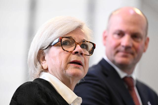 France's Defence Minister Catherine Vautrin (L) listens to Chief Operating Officer and Managing Director ArianeGroup Jens Franzeck (R) during a visit at the Ariane 6 assembly building as part of ArianeGroup's nuclear deterrence and defense activities in Les Mureaux on March 10, 2026. (Photo by Martin LELIEVRE / AFP)