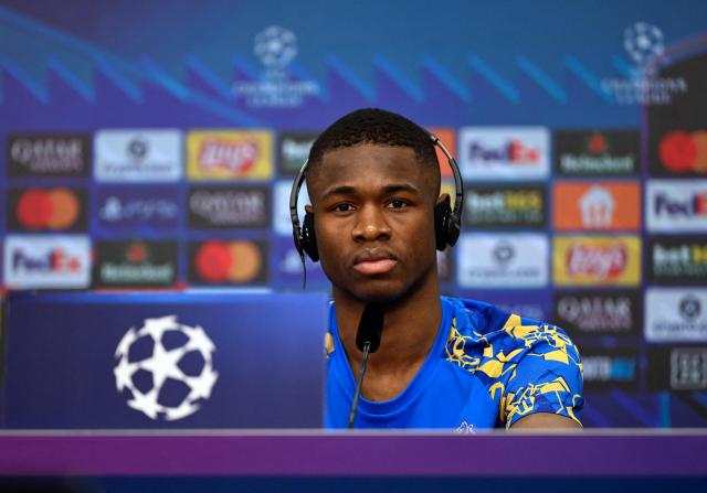 Bayer Leverkusen's Cameroonian forward #35 Christian Kofane attends a press conference prior to the UEFA Champions League - last 16 first leg soccer match Bayer Leverkusen (GER) v Arsenal (ENG) at BayArena in Leverkusen on March 10, 2026. (Photo by Ina FASSBENDER / AFP)