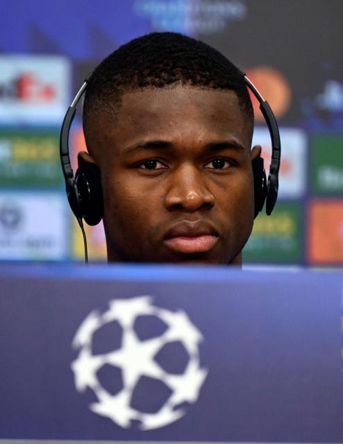 Bayer Leverkusen's Cameroonian forward #35 Christian Kofane attends a press conference prior to the UEFA Champions League - last 16 first leg soccer match Bayer Leverkusen (GER) v Arsenal (ENG) at BayArena in Leverkusen on March 10, 2026. (Photo by Ina FASSBENDER / AFP)