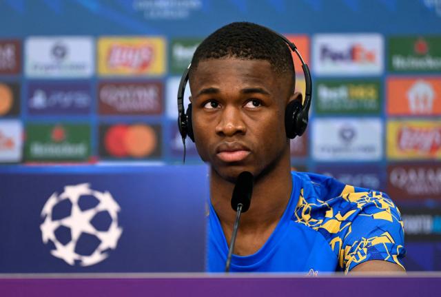 Bayer Leverkusen's Cameroonian forward #35 Christian Kofane attends a press conference prior to the UEFA Champions League - last 16 first leg soccer match Bayer Leverkusen (GER) v Arsenal (ENG) at BayArena in Leverkusen on March 10, 2026. (Photo by Ina FASSBENDER / AFP)