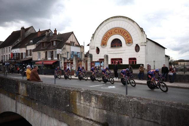 Team Picnic Postnl's riders compete during the 3rd stage of the Paris-Nice cycling race, 23.5 km team time-trial between Cosne-Cours-sur-Loire and Pouilly-sur-Loire, on March 10, 2026. (Photo by Anne-Christine POUJOULAT / AFP)