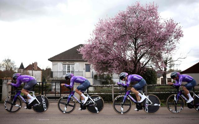 Team Jayco Alula's riders compete during the 3rd stage of the Paris-Nice cycling race, 23.5 km team time-trial between Cosne-Cours-sur-Loire and Pouilly-sur-Loire, on March 10, 2026. (Photo by Anne-Christine POUJOULAT / AFP)