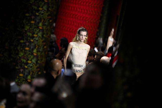 A model presents a creation for Miu Miu for the Women's Ready to Wear Fall/Winter 2026-2027 collection fashion show as part of the Paris Women Fashion Week, in Paris, on March 10, 2026. (Photo by JULIEN DE ROSA / AFP)