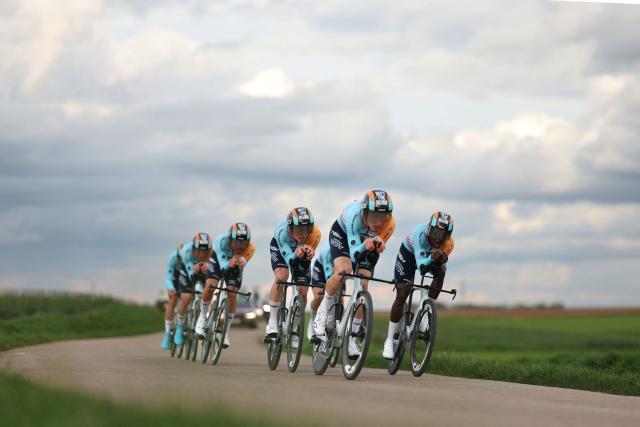 NSN Cycling Team's riders compete during the 3rd stage of the Paris-Nice cycling race, 23.5 km team time-trial between Cosne-Cours-sur-Loire and Pouilly-sur-Loire, on March 10, 2026. (Photo by Anne-Christine POUJOULAT / AFP)