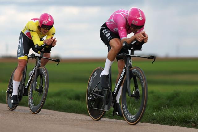 EF Education - EasyPost's US rider Luke Lamperti (L), wearing the overall leader yellow jersey, competes with his team during the 3rd stage of the Paris-Nice cycling race, 23.5 km team time-trial between Cosne-Cours-sur-Loire and Pouilly-sur-Loire, on March 10, 2026. (Photo by Anne-Christine POUJOULAT / AFP)