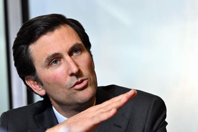 Automobile Distributor Group Ieteren's Chief Financial Officer Edouard Janssen gestures during a press conference of the group to present the 2025 year results in Brussels on March 10, 2026. (Photo by ERIC LALMAND / Belga / AFP) / Belgium OUT