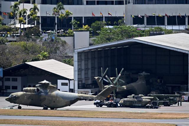 View of Russian helicopters MI-26 at La Carlota airport of the Francisco de Miranda Air Base in Caracas on March 10, 2026. (Photo by Juan BARRETO / AFP)