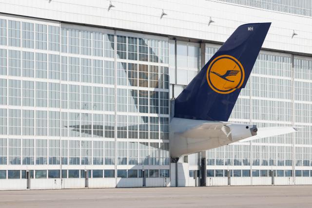 (FILES) The tale of a Lufthansa airplane sticks out of a hangar at the Franz Josef Strauss airport in Munich, southern Germany, on September 20, 2024. Pilots for German airline Lufthansa will go on strike on March 12, 2026 and March 13, 2026 over a pensions dispute, the Vereinigung Cockpit union said in a statement.
Flights to several key Middle East destinations will be excluded from the industrial action "in light of the current situation" in the region, the union said. (Photo by Michaela STACHE / AFP)