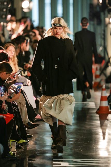 A model presents a creation for Litkovska for the Women's Ready to Wear Fall/Winter 2026-2027 collection fashion show as part of the Paris Women Fashion Week, in Paris, on March 10, 2026. (Photo by Thomas SAMSON / AFP)