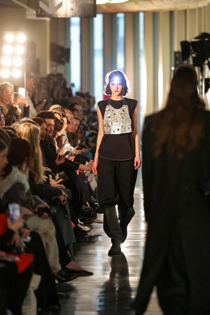 A model presents a creation for Litkovska for the Women's Ready to Wear Fall/Winter 2026-2027 collection fashion show as part of the Paris Women Fashion Week, in Paris, on March 10, 2026. (Photo by Thomas SAMSON / AFP)