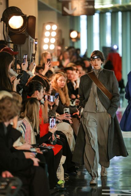 A model presents a creation for Litkovska for the Women's Ready to Wear Fall/Winter 2026-2027 collection fashion show as part of the Paris Women Fashion Week, in Paris, on March 10, 2026. (Photo by Thomas SAMSON / AFP)