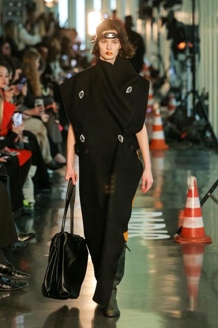 A model presents a creation for Litkovska for the Women's Ready to Wear Fall/Winter 2026-2027 collection fashion show as part of the Paris Women Fashion Week, in Paris, on March 10, 2026. (Photo by Thomas SAMSON / AFP)