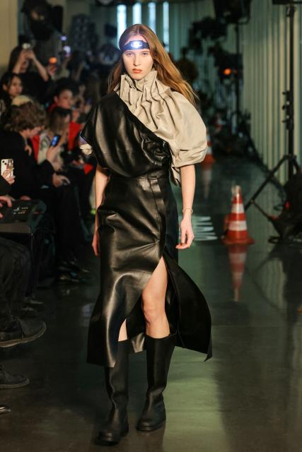 A model presents a creation for Litkovska for the Women's Ready to Wear Fall/Winter 2026-2027 collection fashion show as part of the Paris Women Fashion Week, in Paris, on March 10, 2026. (Photo by Thomas SAMSON / AFP)