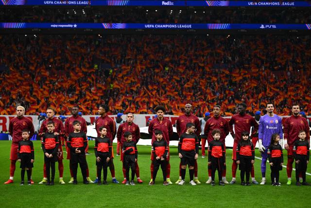 Galatasaray's players line up prior to the  UEFA Champions League round of 16 first leg football match between Galatasaray SK and Liverpool FC at the Ali Sami Yen Sports Complex in Istanbul on March 10, 2026. (Photo by YASIN AKGUL / AFP)