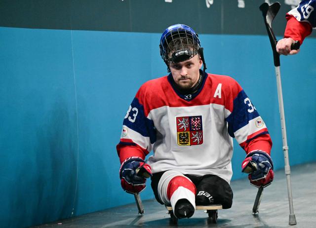 Czech Republic Vaclav Hecko leaves the rink during the half time of the ice hockey match between Czech Republic and Canada at the Milano Cortina 2026 Paralympic Winter Games in Milan on March 10, 2026. (Photo by Stefano RELLANDINI / AFP)
