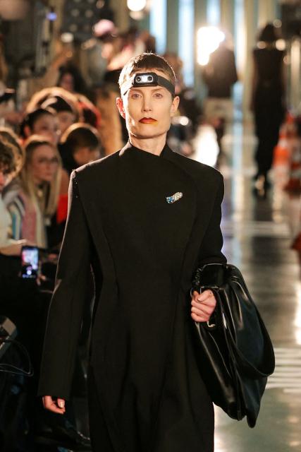 A model presents a creation for Litkovska for the Women's Ready to Wear Fall/Winter 2026-2027 collection fashion show as part of the Paris Women Fashion Week, in Paris, on March 10, 2026. (Photo by Thomas SAMSON / AFP)