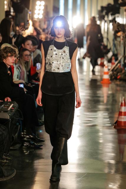 A model presents a creation for Litkovska for the Women's Ready to Wear Fall/Winter 2026-2027 collection fashion show as part of the Paris Women Fashion Week, in Paris, on March 10, 2026. (Photo by Thomas SAMSON / AFP)