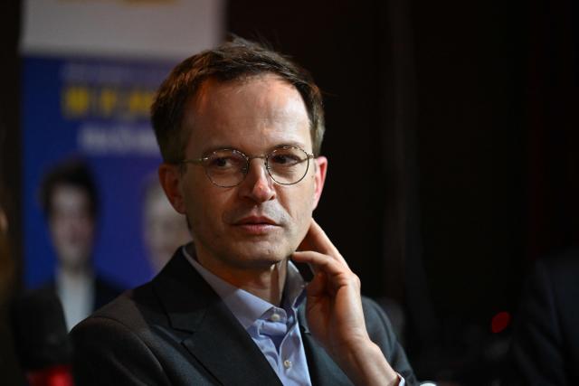 Ensemble centre-right party's mayoral candidate for Paris Pierre-Yves Bournazel looks at during a campaign meeting ahead of the Paris municipal elections in Paris on March 10, 2026. (Photo by Martin LELIEVRE / AFP)