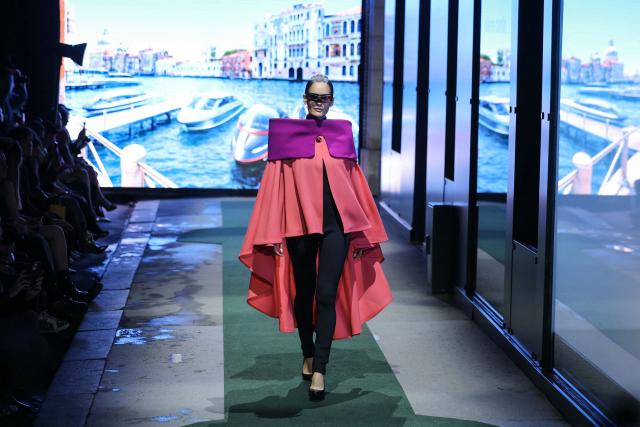 A model presents a creation for Pierre Cardin for the Women's Ready to Wear Fall/Winter 2026-2027 collection fashion show as part of the Paris Women Fashion Week, in Paris, on March 10, 2026. (Photo by Thomas SAMSON / AFP)