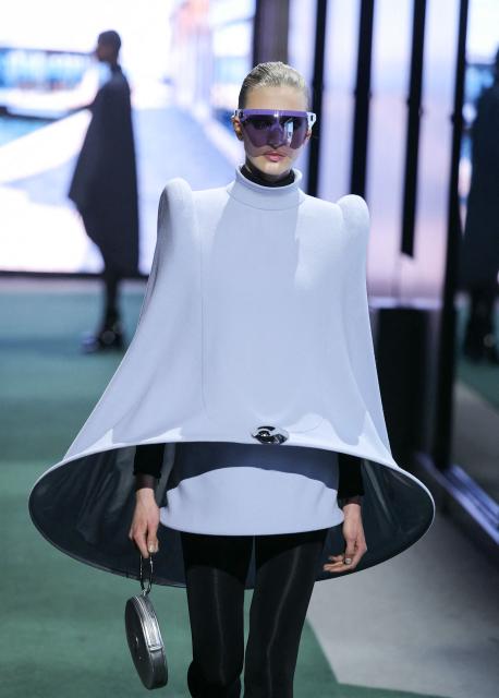 A model presents a creation for Pierre Cardin for the Women's Ready to Wear Fall/Winter 2026-2027 collection fashion show as part of the Paris Women Fashion Week, in Paris, on March 10, 2026. (Photo by Thomas SAMSON / AFP)
