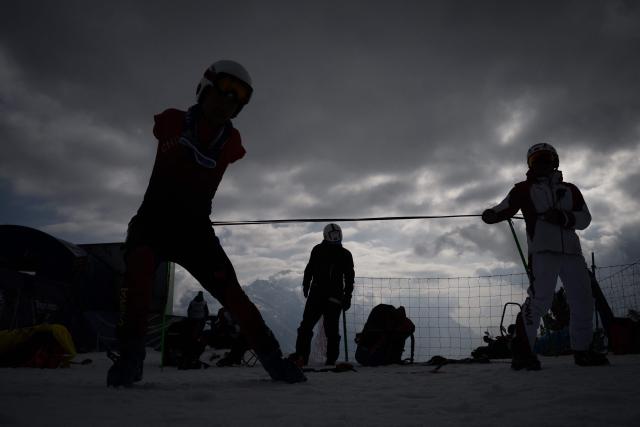 Athletes prepare for the alpine skiing combined event during the Milano Cortina 2026 Paralympic Winter Games in Cortina d’Ampezzo on March 10, 2026. (Photo by JEFF PACHOUD / AFP)