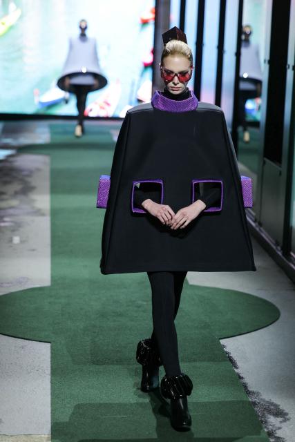 A model presents a creation for Pierre Cardin for the Women's Ready to Wear Fall/Winter 2026-2027 collection fashion show as part of the Paris Women Fashion Week, in Paris, on March 10, 2026. (Photo by Thomas SAMSON / AFP)