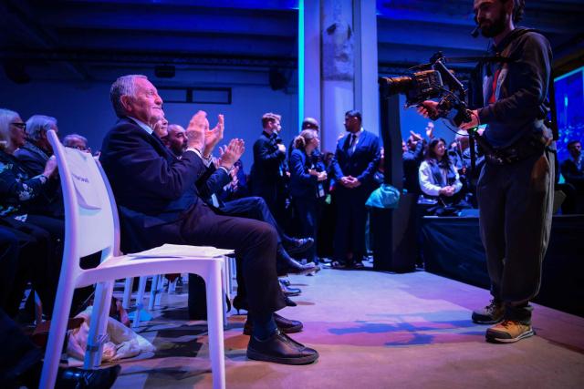 President of Business software publisher Cegid and Vice-President of French Football (FFF) Jean-Michel Aulas applauds during a campaign rally for his candidacy in the Lyon municipal elections, in Lyon, central-eastern France, on March 10, 2026. (Photo by OLIVIER CHASSIGNOLE / AFP)