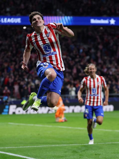 Atletico Madrid's Argentine forward #19 Julian Alvarez celebrates scoring his team's third goalduring the UEFA Champions League last 16 first leg football match between Club Atletico de Madrid and Tottenham Hotspur at Metropolitano Stadium in Madrid on March 10, 2026. (Photo by Thomas COEX / AFP)