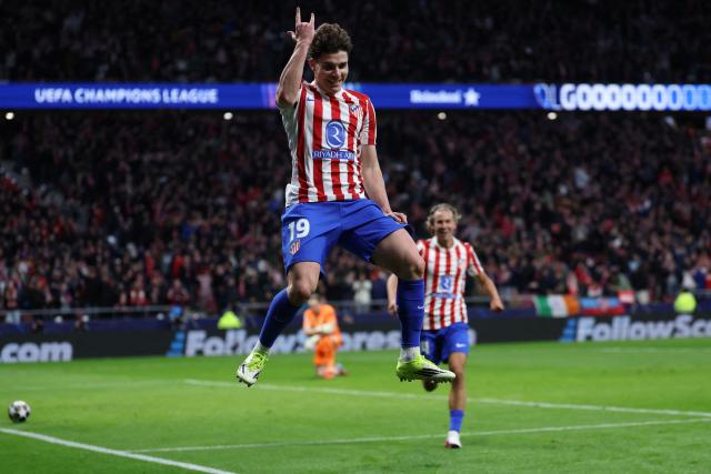 TOPSHOT - Atletico Madrid's Argentine forward #19 Julian Alvarez celebrates scoring his team's third goalduring the UEFA Champions League last 16 first leg football match between Club Atletico de Madrid and Tottenham Hotspur at Metropolitano Stadium in Madrid on March 10, 2026. (Photo by Thomas COEX / AFP)