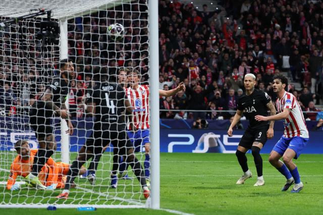 Atletico Madrid's Spanish defender #24 Robin Le Normand scores his team's fourth goal during the UEFA Champions League last 16 first leg football match between Club Atletico de Madrid and Tottenham Hotspur at Metropolitano Stadium in Madrid on March 10, 2026. (Photo by Thomas COEX / AFP)
