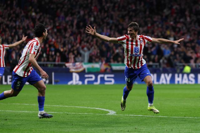 Atletico Madrid's Spanish defender #24 Robin Le Normand (R) celebrates scoring his team's fourth goal during the UEFA Champions League last 16 first leg football match between Club Atletico de Madrid and Tottenham Hotspur at Metropolitano Stadium in Madrid on March 10, 2026. (Photo by Thomas COEX / AFP)
