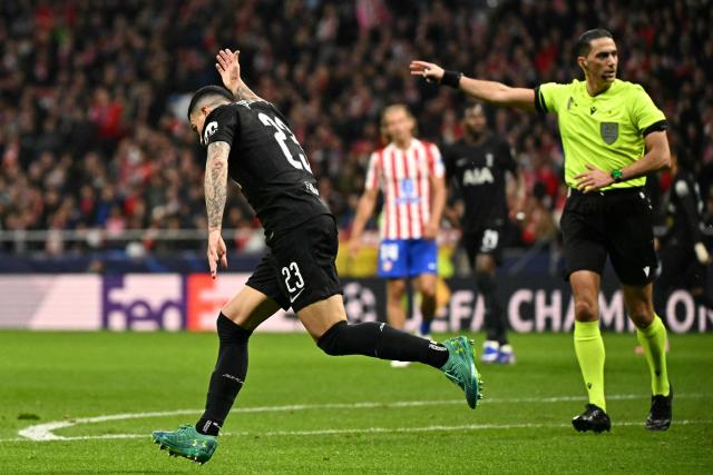 Tottenham Hotspur's Spanish defender #23 Pedro Porro celebrates scoring his team's first goal during the UEFA Champions League last 16 first leg football match between Club Atletico de Madrid and Tottenham Hotspur at Metropolitano Stadium in Madrid on March 10, 2026. (Photo by Javier SORIANO / AFP)