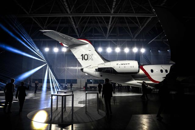 This photograph shows the unveiling ceremony of Dassault Aviation's new business aircraft the Falcon 10X at Dassault headquarters in Bordeaux, south-western France on March 10, 2026. Master of the Rafale fighter jets, French manufacturer Dassault has unveiled the Falcon 10X, its latest private jet. Rarer and more expensive than those of its North American competitors, it is eagerly awaited for its military-grade performance in a growing market. (Photo by Christophe ARCHAMBAULT / AFP)