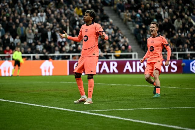 Barcelona's Spanish forward #10 Lamine Yamal celebrates scoring the team's first goal during the UEFA Champion's League, round of 16 football match between Newcastle United and FC Barcelona at St James' Park in Newcastle-upon-Tyne, north east England on March 10, 2026. (Photo by Paul ELLIS / AFP)