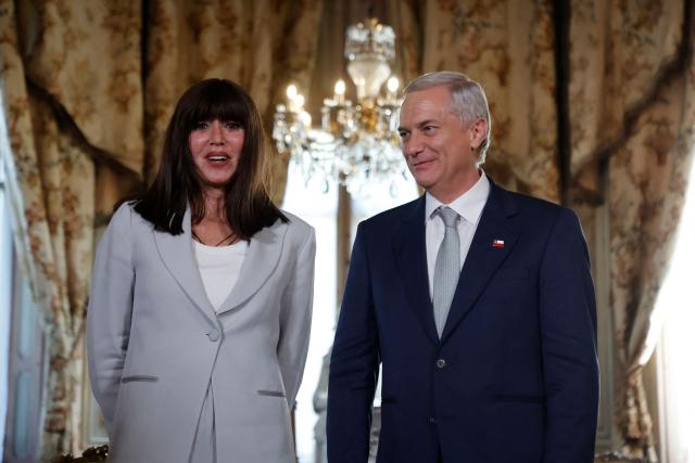 Chile's President-elect Jose Antonio Kast (R) poses with Italy's Minister of University and Research, Anna Maria Bernini, during a meeting at the Cousino Palace in Santiago on March 10, 2026, ahead of the presidential inauguration. (Photo by Raul BRAVO / AFP)